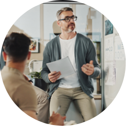 Man in meeting with whiteboard
